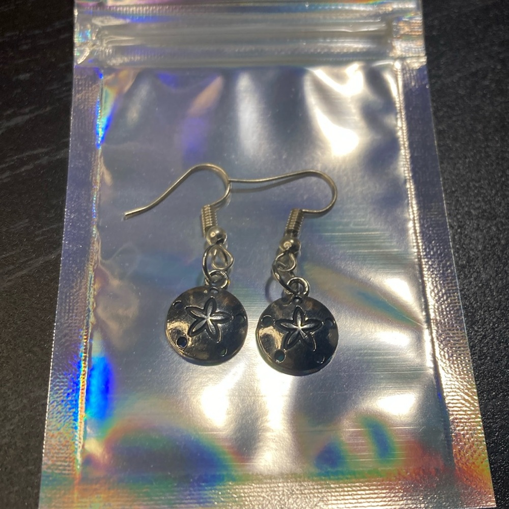 Silver san dollar earrings